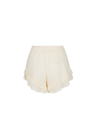 Cream ruffled shorts with a pleated, layered skirt design, shown against a plain white background.