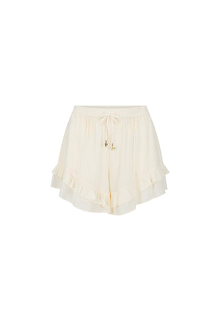 Cream ruffled shorts with a drawstring waist and small gold decorative accents, shown against a plain white background.